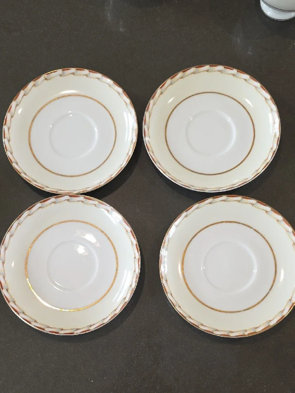 Mikado Porcelain Tea Cup and Saucer Set with Pink Floral Accents and Gold Trim
